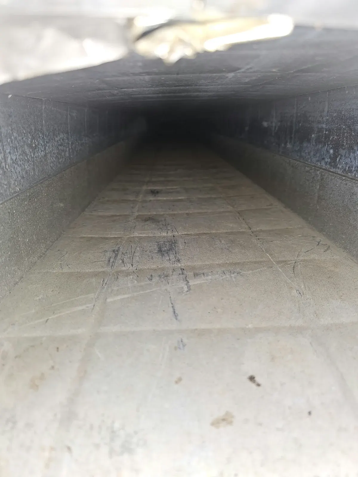 After: the same rectangular duct with a clean bottom panel
